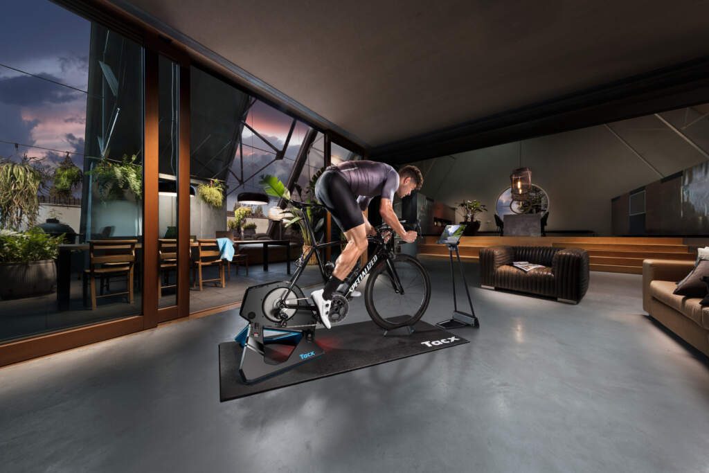 The Tacx trainer set up for a full winter’s workout. $2M house and ripped calves not included.